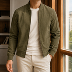 Bomber Jacket in Olive Green showing the ribbed trims and angled welt pockets