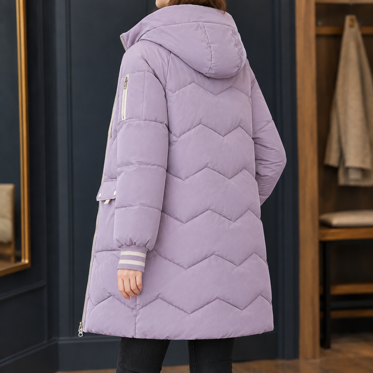 Woman wearing the chevron quilted hooded jacket in purple