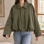 Woman wearing the oversized cropped bomber jacket in green