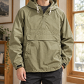 Anorak Jacket in Green showing the drawcord hood and half-zip front