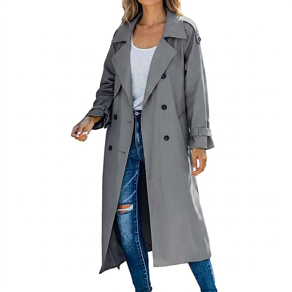 Woman wearing the longline trench coat in gray