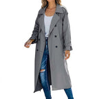 Woman wearing the longline trench coat in gray