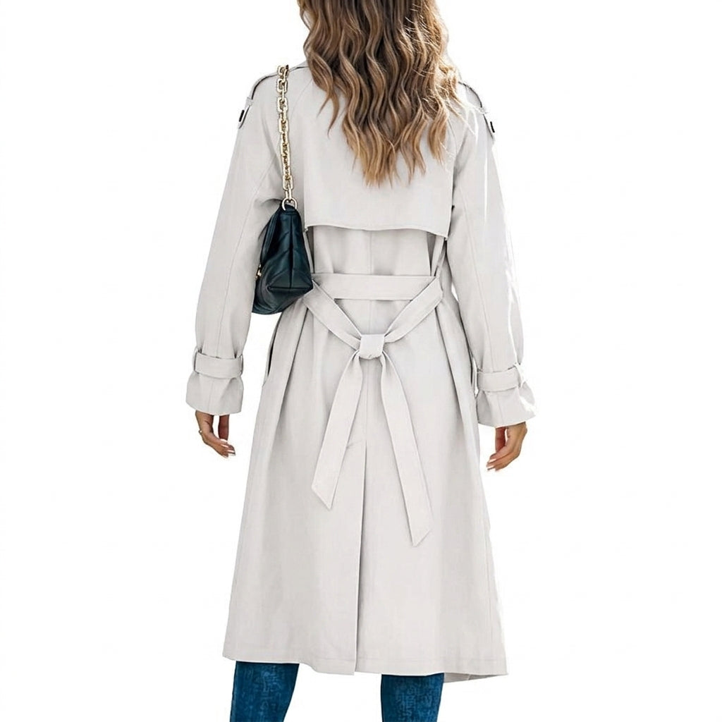 Rear view of the longline trench coat showing its clean back silhouette