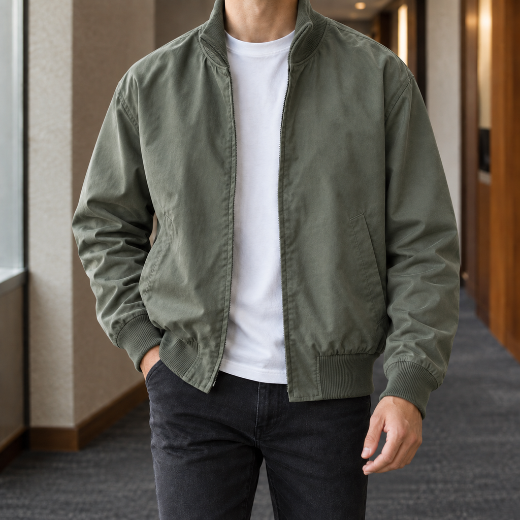 Bomber Jacket in Military Green showing the ribbed collar, cuffs, and hem