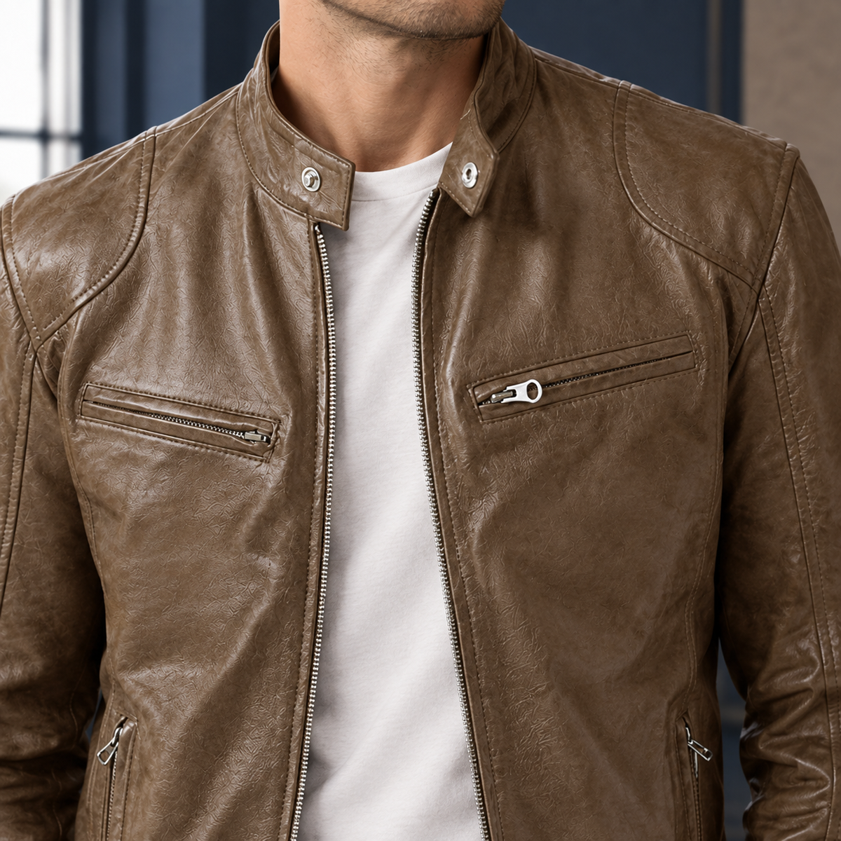 Cafe Racer Jacket detail view 2 showing the snap tab collar and four zipped pockets.