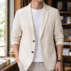 Blazer in Cream showing the notched lapels and two-button front