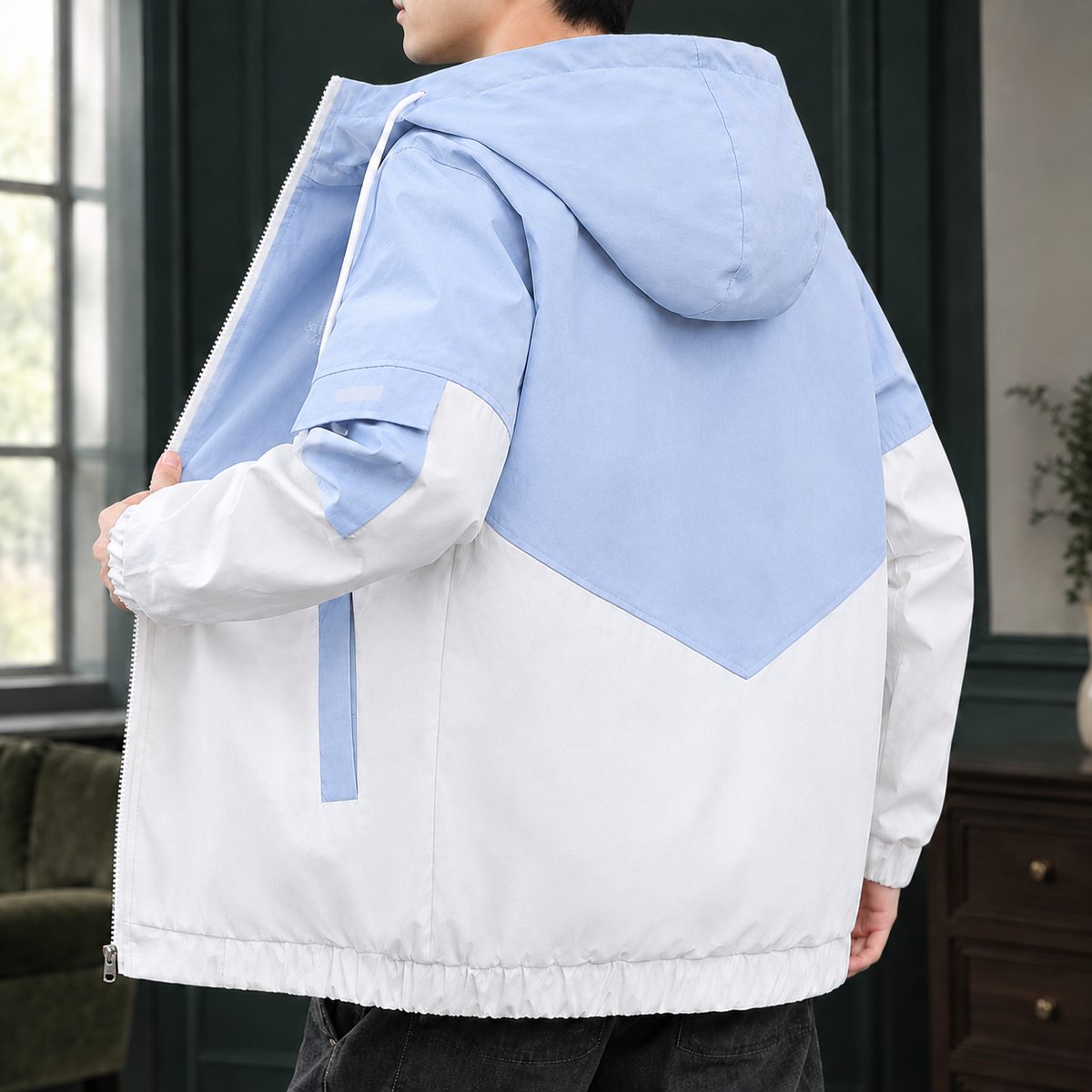 Color-Block Jacket in Light Blue showing the graphic color blocking and drawcord hood