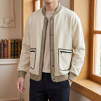 Contrast Jacket in Apricot showing the contrast-trimmed pockets and layered closure
