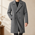 Double Breasted Overcoat in Gray showing the broad notched lapels and four button front.