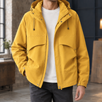 Hooded Utility Jacket in Yellow showing the drawcord hood and four front pockets.