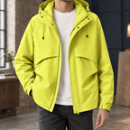 Hooded Utility Jacket in Fluorescent Yellow showing the drawcord hood and four front pockets.