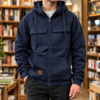 Hooded Utility Jacket in Navy Blue showing the drawcord hood, four front pockets, and ribbed trims.