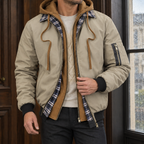 Layered Jacket in Khaki showing the layered hood panel, plaid collar trim, and quilted lining.