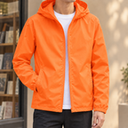 Hooded Jacket in Orange showing the fixed hood and streamlined zip front
