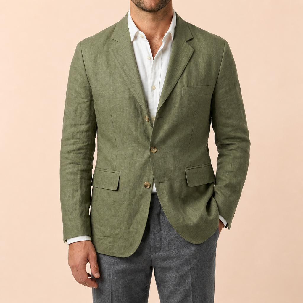 Green linen blend blazer, hand in pocket, white shirt and gray pants