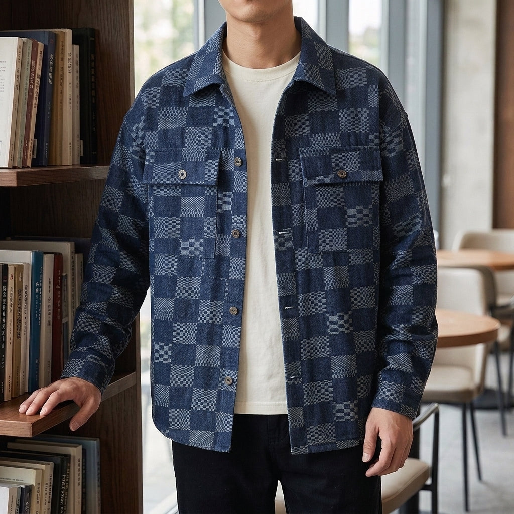 Denim Jacket in Blue showing the tonal patchwork texture and flap chest pockets