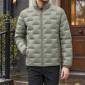 Quilted Jacket in Grass Green showing the rectangular quilting and high stand collar.
