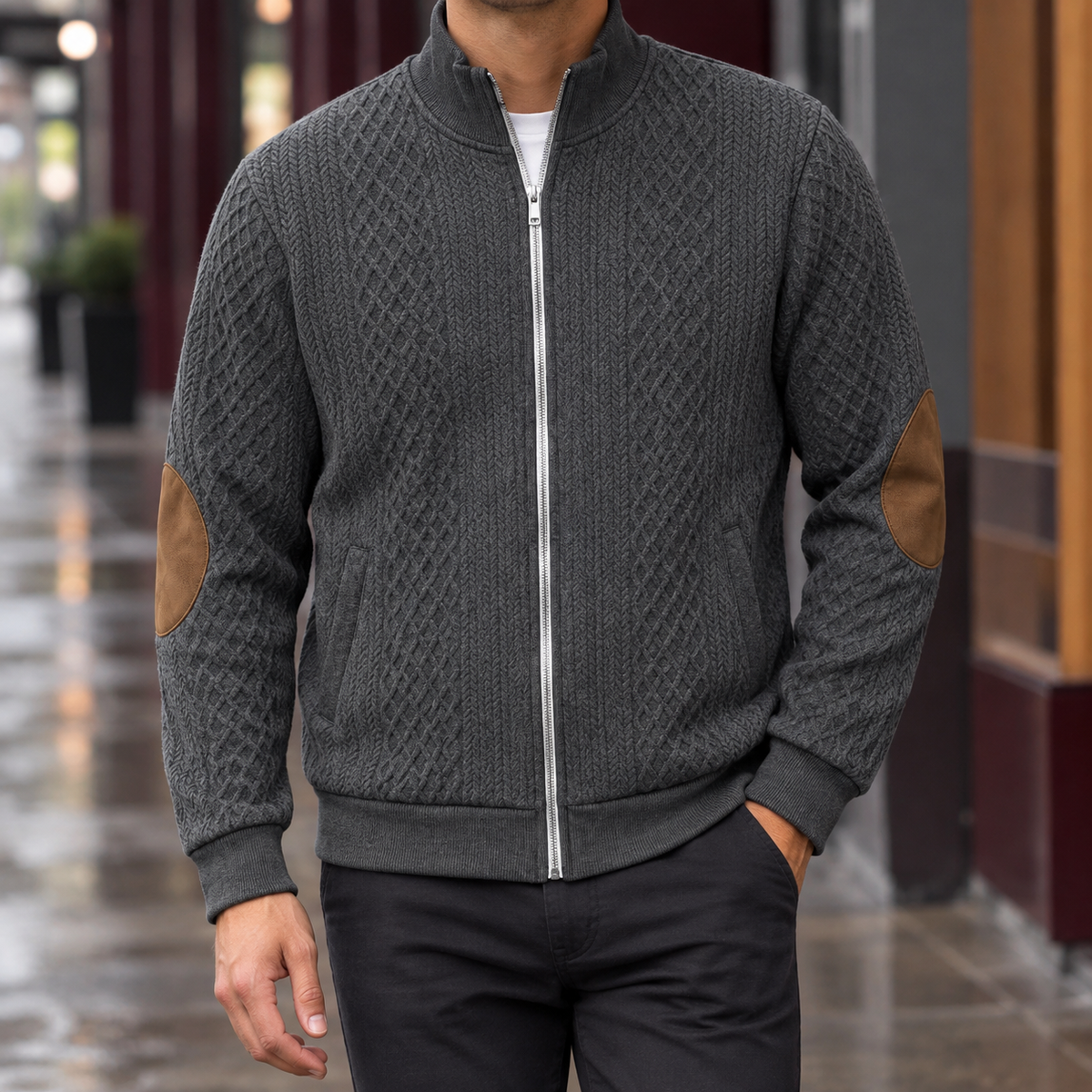 Quilted Jacket in Dark Gray showing the diamond quilting, leather elbow patches, and ribbed trims.