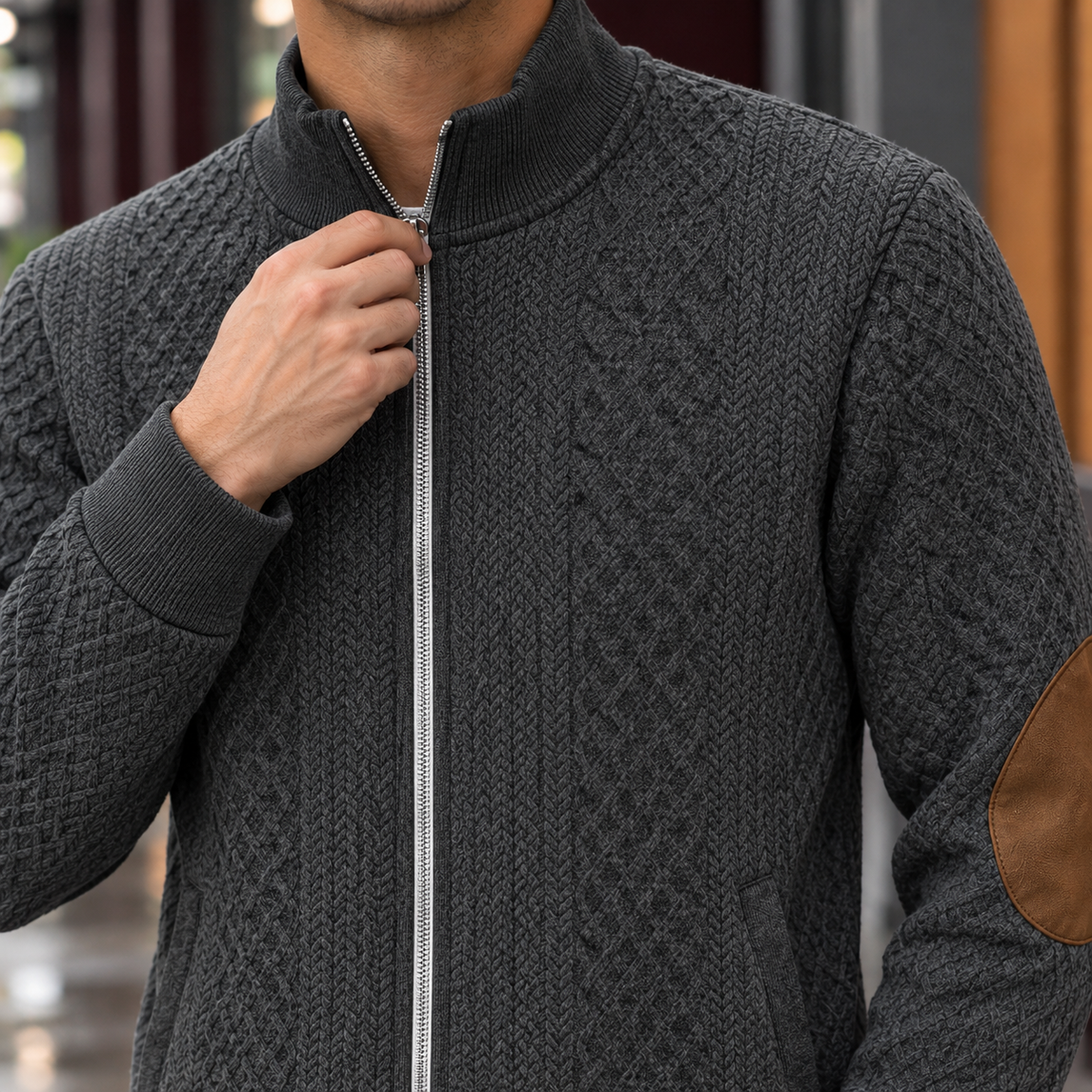 Quilted Jacket detail view 2 showing the diamond quilting, leather elbow patches, and ribbed trims.