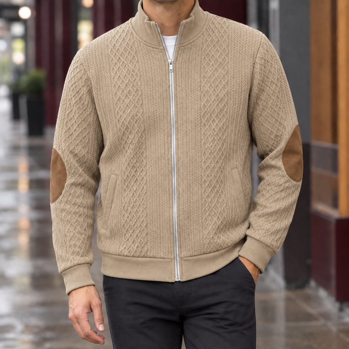Quilted Jacket in Khaki showing the diamond quilting, leather elbow patches, and ribbed trims.