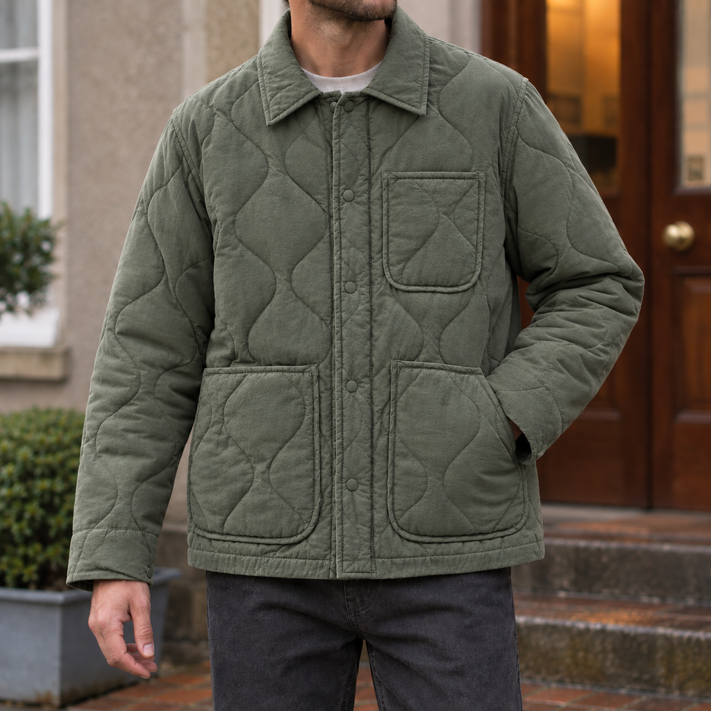 Quilted Jacket in Military Green showing the wave quilting and three patch pockets.