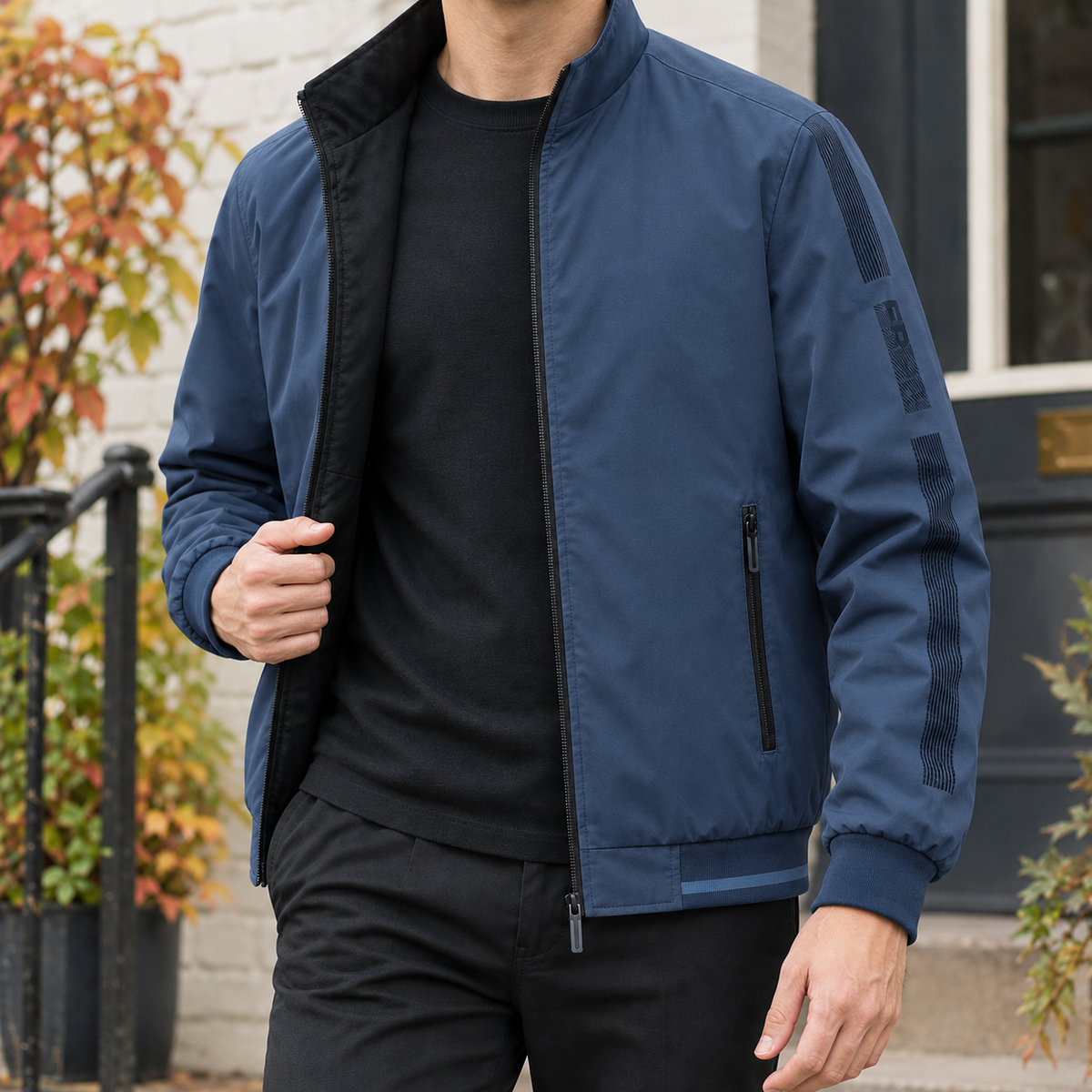 Reversible Jacket in Navy Blue showing the reversible two-tone construction and ribbed trims.