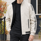 Reversible Jacket in Khaki showing the reversible two-tone construction and ribbed trims.