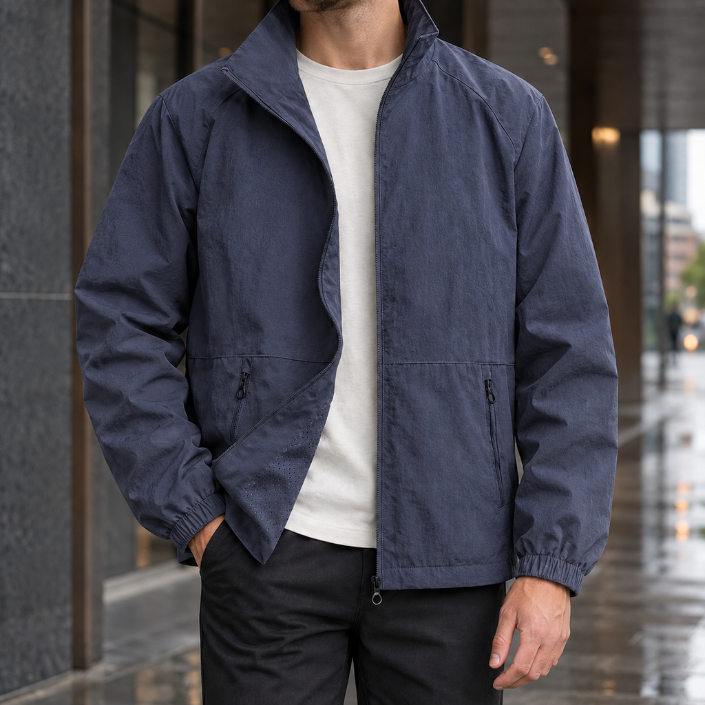 Stand Collar Jacket in Dark Blue showing the tall collar and zipped front pockets.
