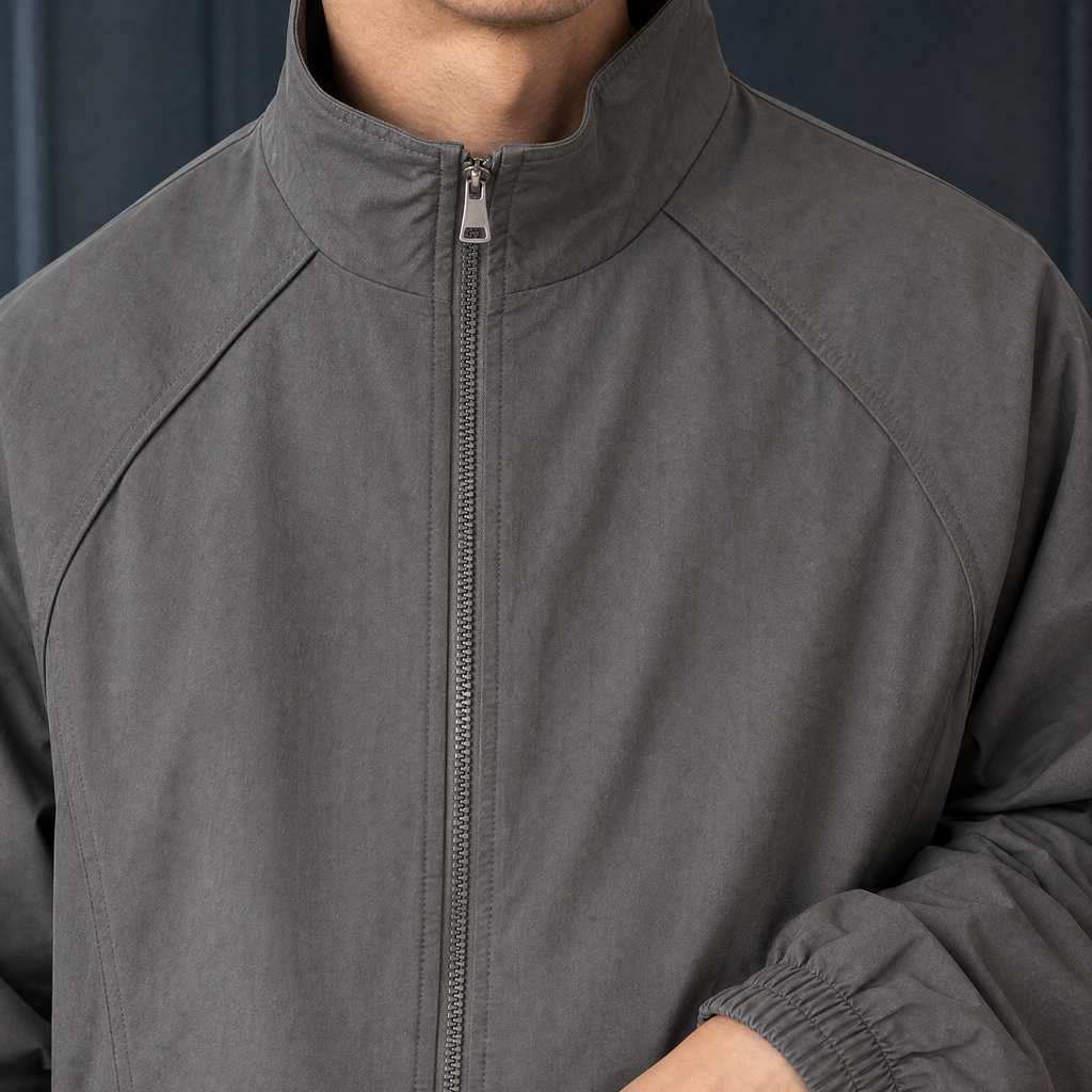 Stand Collar Jacket detail view 2 showing the structured collar and two way zipper.