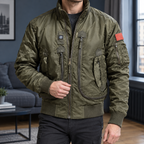 Tactical Jacket in Military Green showing the ribbed trims and multiple zipped pockets.