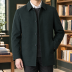 Tailored Jacket in Dark Green showing the pointed collar and single breasted front.