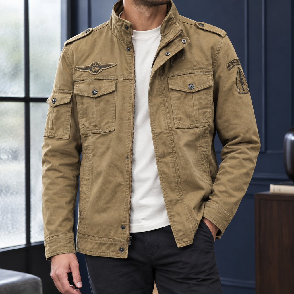 Utility Jacket in Khaki showing the snap flap pockets and layered front closure.