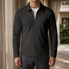 Zip Jacket in Black showing the fine waffle texture and pointed collar