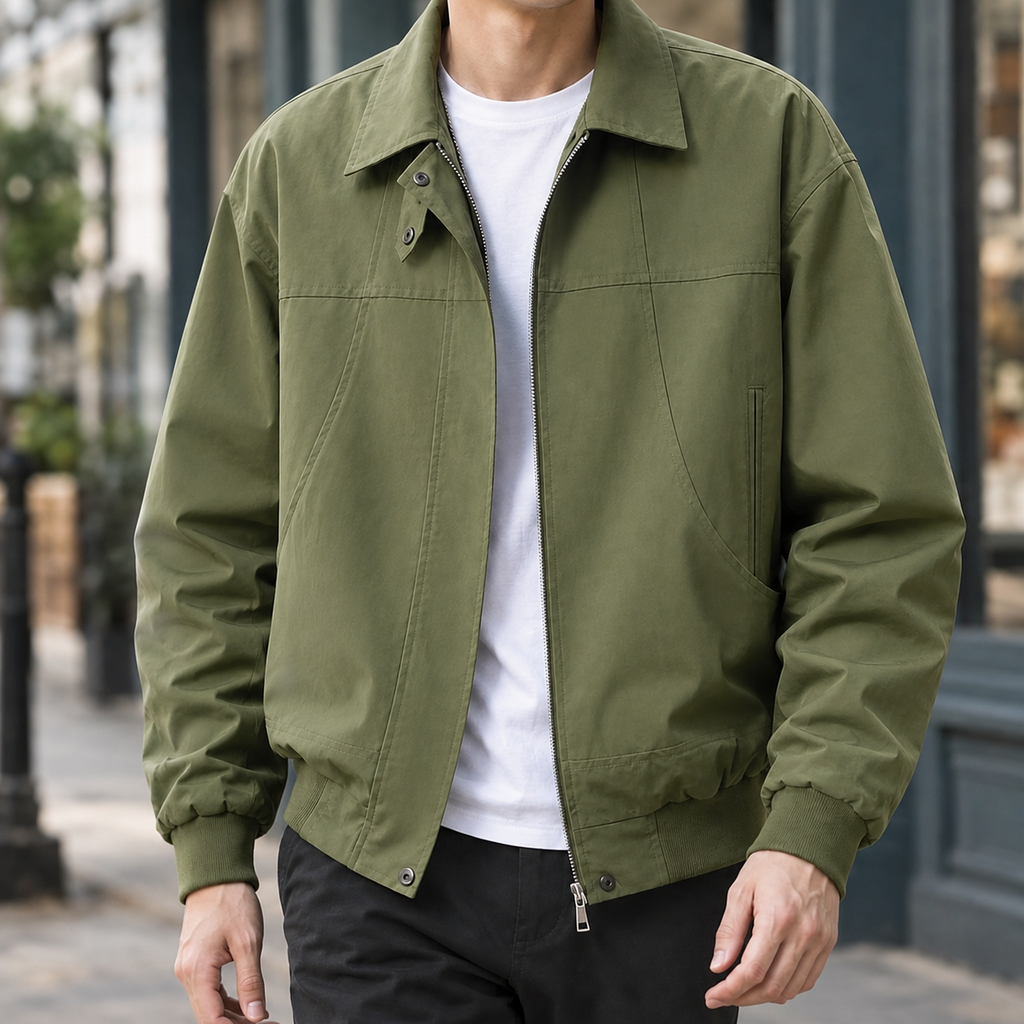 Zip Jacket in Green showing the paneled construction and ribbed trims