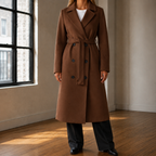 Brown belted overcoat with double-breasted front on a model.