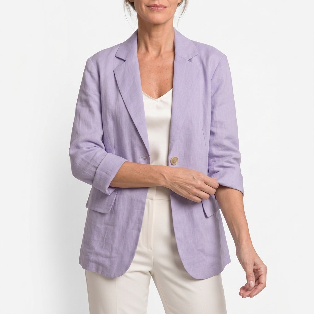 Purple cotton blend blazer with a single-button front on a model against a white background.