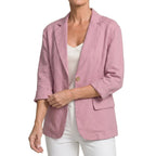Pink cotton blend blazer with relaxed sleeves on a model.