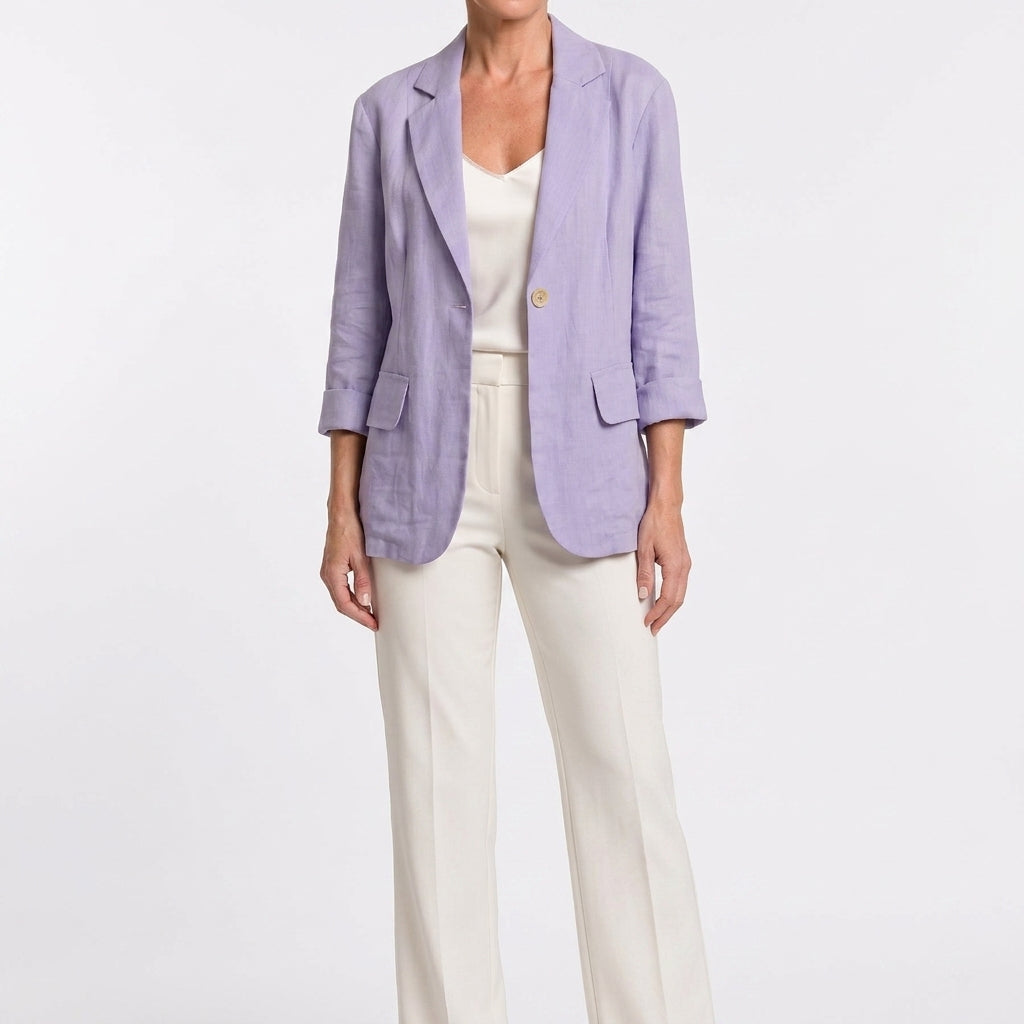 Full-length view of a model wearing the purple cotton blend blazer.