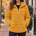 Yellow faux fur jacket worn on a Washington DC street.