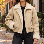 Apricot womens faux suede bomber jacket worn on a Washington DC street.