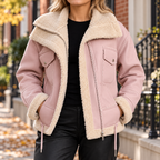 Pink womens fleece lined biker jacket worn on a Washington DC street.