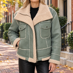 Green womens fleece lined biker jacket worn on a Washington DC street.