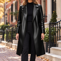 Black trench coat worn on a Washington DC street.