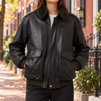 Black womens leather bomber jacket worn on a Georgetown street in Washington DC.