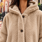 Close-up of the overcoats showing the collar and fabric texture.