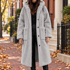 Gray overcoats worn on a Washington DC street.