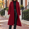 Burgundy overcoats worn on a Washington DC street.