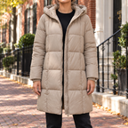 Beige puffer jackets worn on a Washington DC street.