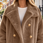 Close-up of the overcoats showing the collar and fabric texture.