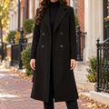 Black trench coat worn on a Washington DC street.